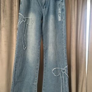 Aeropostale Women's Light Blue Flare Jeans with Bow Accents